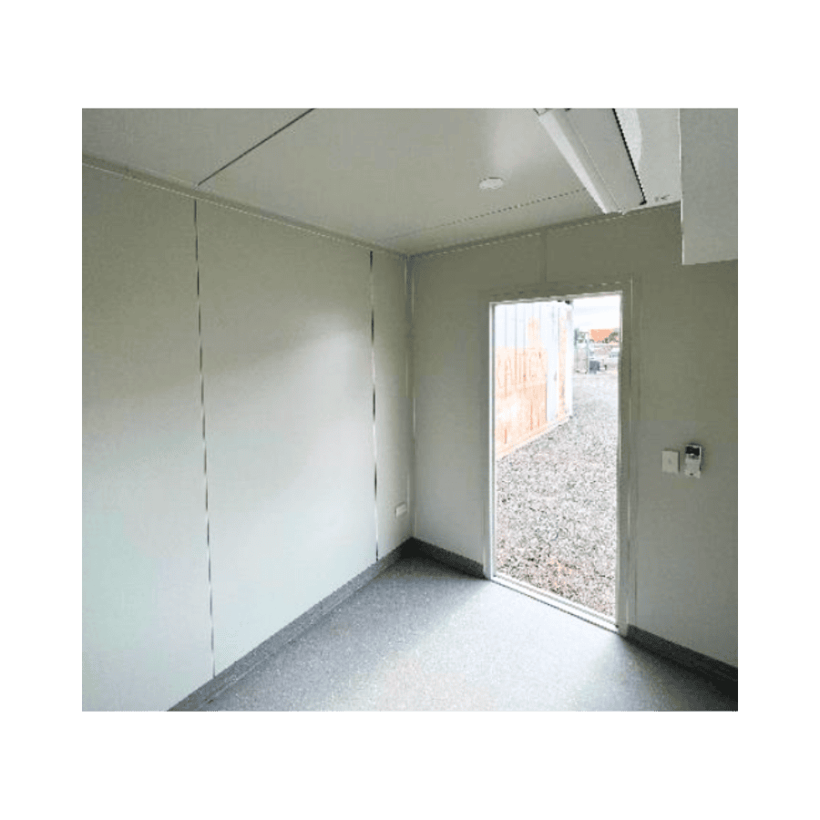 Insulation and flooring installed inside a modified shipping container